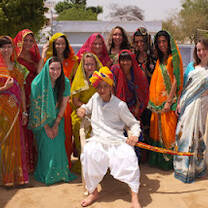 Volunteers in traditional Indian clothing