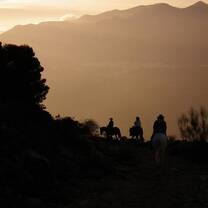 Horse riding in the mountains