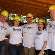 A group of Volunteers from Global Village in construction site.