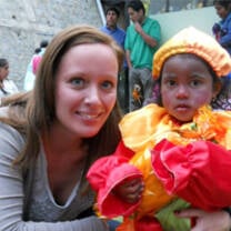 Our volunteer organizing a dance performance with children
