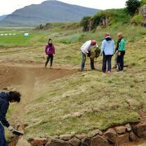 Volunteers build a turf wall in Iceland with Volunteers for Peace