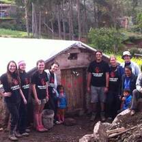 Volunteers with a finished greenhouse!