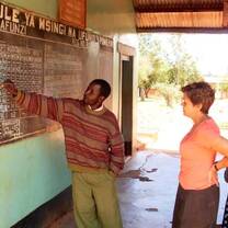 Volunteers working with the local people in a school