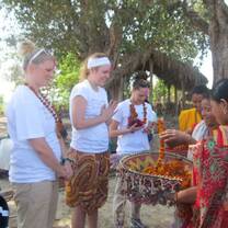 Volunteers being welcomed to Chainpur