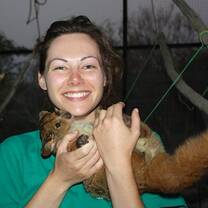 Volunteers interacting with our Bush Baby