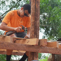 Volunteer working on house build