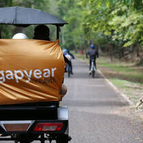 Volunteers in tuk tuk at Angkor Wat Archeological Park 