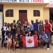 Group of volunteers in front of building