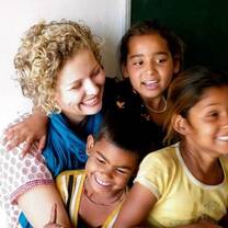 Volunteer with children in India