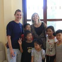 Volunteer with children in Cambodia