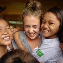 Volunteer with children in Cambodia