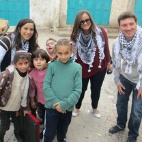 Volunteers with children in Palestine
