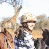 Horse and lion volunteering Antelope Park