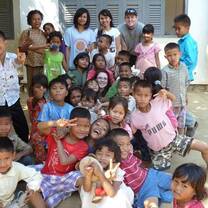 Volunteer with children in Cambodia