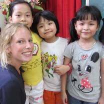 Volunteer with children in Vietnam