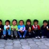 Children eating bananas in Ecuador