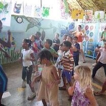 Students at Las Terrenas International School learn the basic steps of Zumba.