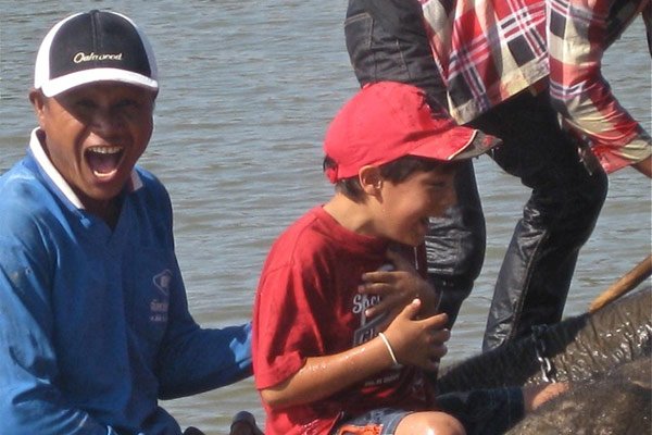 Ruth's son gets up close and personal with an elephant in Thailand