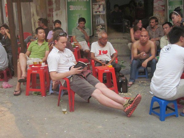 Spencer mixes with Vietnamese locals