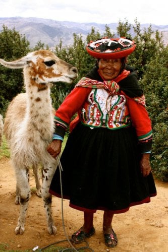 Local Peruvian women with llama 